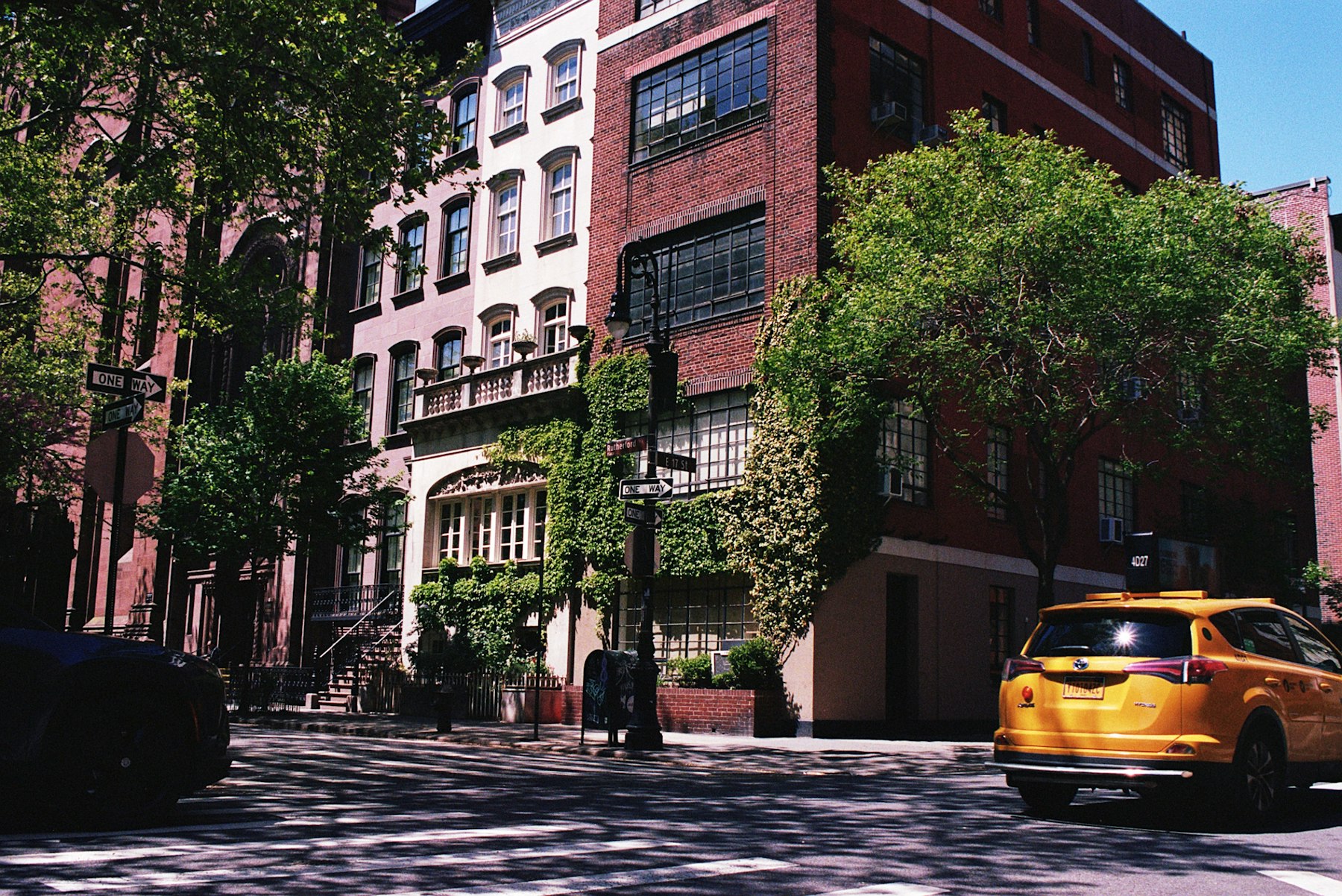 A quiet, tree-lined Manhattan side street.